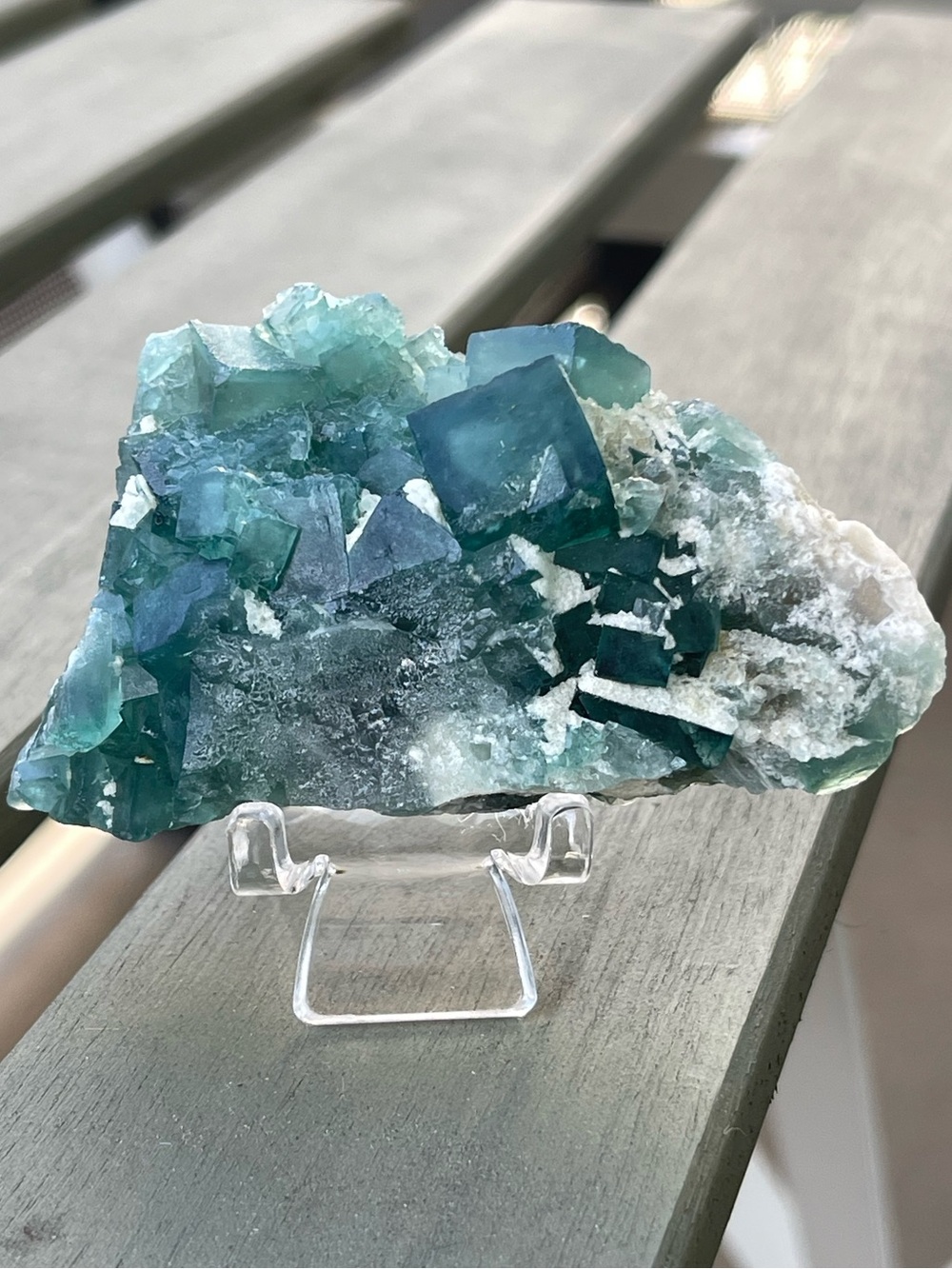 Green Raw Fluorite Mineral Specimen on a Clear Stand